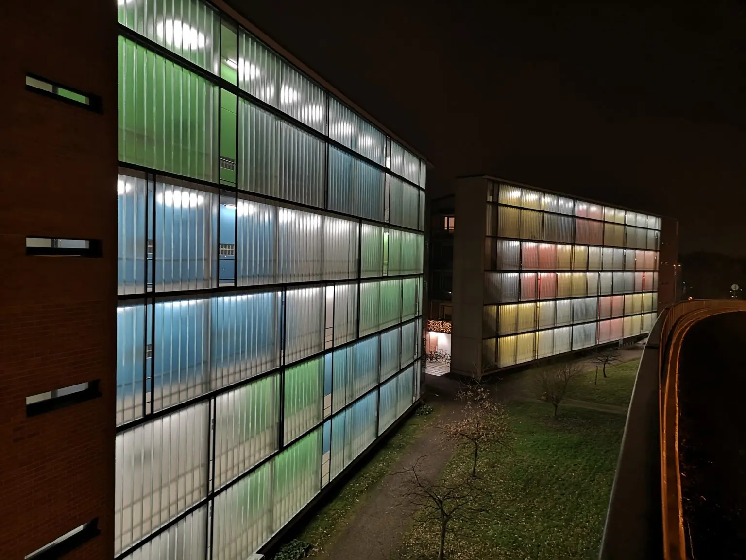 Kerro the stairwells of the stalo is lit colorfully.